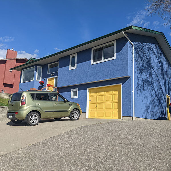 Bumblebee Stucco white house turned to blue complete